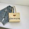 Bolso de lona de gran capacidad para mujer, bolso de hombro informal combinable para primavera 2025, ideal para estudiantes universitarias y estudiantes de secundaria.