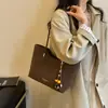 Bolso Tote Elegante de Gran Capacidad Estilo Nuevo 2026 Bolso Casual de Moda Bolso de Hombro Sencillo Femenino Viaje Retro