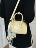Bolso almohada retro de moda estilo coreano, bolso de mano para mujer para el trabajo, nuevo bolso pequeño de un solo hombro cruzado dulce para el verano 2026