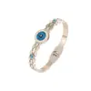 Nova Joia Europeia e Americana de Aço Titânio, Pulseira Olho com Gotejamento de Óleo, Pulseira Oca de Aço Inoxidável Estilo Corte com Turquesa Incrustada