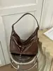 Bolso de hombro minimalista estilo coreano transfronterizo para mujer, nuevo diseño de nicho vintage 2026, bolsa de mano de gran capacidad para el día a día