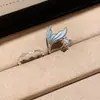 Anillo abierto de cola de pez redondo con gota de aceite de circón, joyería versátil de nicho de alta gama, joyería exquisita y de moda para mujer al por mayor