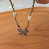 Collar de cuentas de mariposa estilo chino retro de madera y mariposa para mujer, cadena de clavícula de estilo étnico de lujo ligero y de alta gama.