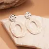 Pendientes de botón geométricos cuadrados y de corazón verdes transfronterizos europeos y americanos, Pendientes de botón de lujo ligero de alta gama, Pendientes de moda exagerados para mujer