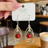 Pendientes de Aro Espiral con Circonita Zirconia Ultra-Hada Bañados en Oro Real Tacto de Alta Gama Cuentas Rojas Doble Gota de Agua Diseño de Nicho Ganchos para Oreja
