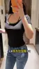 Camiseta de manga corta ajustada para mujer, nuevo diseño de verano, estilo americano, efecto dos piezas, pura y sexy, cuello halter, top de hombro normal
