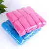 Cubrezapatos desechables de fábrica tela no tejida engrosada resistente al desgaste antideslizante para el hogar transpirable cubrepies para el pie cubrezapatos a prueba de polvo venta al por mayor