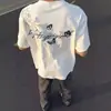 Entrega transfronterizaCamiseta de manga corta con bordado floral de alta costura para hombre, nuevo estilo de verano, corte holgado, ropa de pareja, top de moda ins