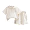 Conjunto de dos piezas de polo Lel de color sólido para bebé de manga corta Verano 2025 Nuevo Ropa de moda para niños con cremallera Ropa para niños
