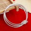 Pulsera étnica retro plateada Miao para mujer, pulsera de plata con forma de estrella y flor de coche, pulsera de plata redonda con forma de vientre, venta directa de fábrica