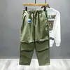 Marca de moda de otoño e invierno Pantalones casuales pesados americanos Pantalones tipo harén para hombre Cintura elástica Calle alta Sueltos Rectos Pantalones casuales para hombre