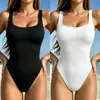 Traje de baño bikini de una pieza sexy sin espalda, color sólido, patrón de ondas, estilo nuevo, comercio exterior transfronterizo europeo y americano para mujer, en stock