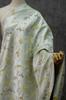 [Ardilla de pino y ciprés] estilo nacional brocado cheongsam falda abrigo moda infantil tela tejido de hilo teñido multicolor cortina