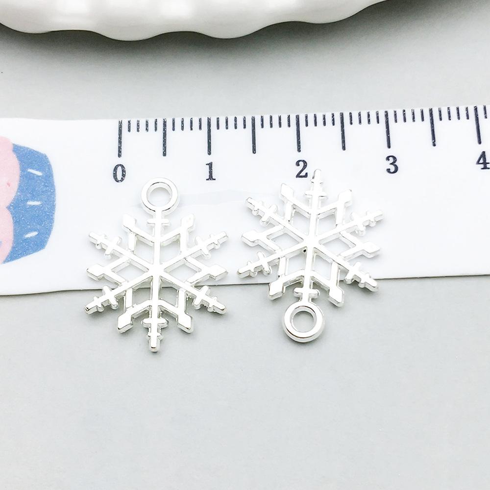 20021-M-亮银锌合金圣诞雪花15x19mm-1g.pn