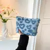 Bolsa de Maquiagem de Grande Capacidade com Design de Nicho para Mulheres 2025 Nova Bolsa de Mão Moda Única Doce Coração Pequena Bolsa