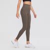 Procesamiento y personalización de pantalones de yoga para mujer, leggings de cintura alta con cepillado de doble cara, pantalones deportivos de fitness con realce de glúteos color piel OEM.