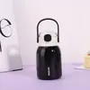 Nueva taza térmica elegante de acero inoxidable con alto valor estético, portátil y conveniente, compacta y simple, con un ambiente juvenil