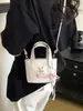 Bolso grande de alta capacidad transfronterizo 2026, bolso texturizado de alta gama, bolso cubo coreano de nicho para mujer