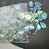 AB Magia Color Cristal de Color Base Plana Superficie Lisa Piedra al Natural Gota de Agua Mixta Forma de Huevo Piedra de Luna Sintética Accesorios para Joyería al por Mayor