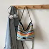 Bolso Tejido de Moda con Bloques de Color para Mujer 2026 Primavera Nuevo Estilo Ins Simple Casual Bolso Cubo Elegante Bolso de Hombro