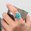 Anillo Ovalado Retro Europeo y Americano con Relieve Turquesa Imitación Estilo Étnico Tallado Ancho Joyería Fabricante Venta al por Mayor