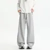 Pantalones de chándal pesados retro americanos nuevos 2026, holgados para hombre, pantalones largos casuales fluidos, pantalones de pierna recta modernos y elegantes