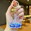 Chaveiro Vela Azul Série Oceano Infundido com Óleo Pingente Criativo de Areia Líquida Acrílica Acessório para Alça de Bolsa Presente