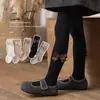 Leggings para niños 2026 primavera y otoño nuevo estilo pantimedias para niñas con rayas finas y lazo, calcetines para bebé de PP grande al por mayor
