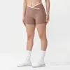 Pantalones de yoga de cintura en V europeos y americanos, shorts deportivos cortos de secado rápido para mujer con efecto melocotón en los glúteos, shorts de fitness de cintura alta para levantar glúteos para el verano