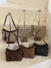 Bolsa elegante de gran capacidad, nueva moda de verano 2026, bolso cruzado de nicho moderno, bolsa de mano simple para el día a día