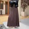 Elegante saia plissada de cintura alta estilo retrô para mulheres, novo estilo para o início do outono de 2026, saia plissada de corte A que afina a silhueta e é estilosa, com barra larga