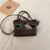 Bolso pequeño cuadrado, simple y casual, nuevo estilo vintage otoño 2026, diseño único de nicho, bolso cruzado de un solo hombro para mujer