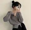 Chaqueta suéter con capucha de doble cremallera corta chic coreana para mujer 2026 estilo suave color liso prenda exterior de punto