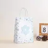 Bolsa de regalo para fiesta de Navidad transfronteriza, copo de nieve de invierno, bolso de mano de papel Kraft, bolsa de regalo navideña