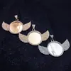 Accesorios DIY de Amazon cobre Diamante pequeño colgante redondo + colgante de alas punto de fábrica Nuevo 2021