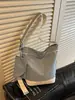 Bolsa estilo preguiçoso feminina 2026 nova bolsa de lona moda casual para trabalho deslocamento bolsa de ombro única bolsa transversal tipo balde
