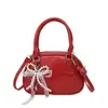 Nuevo Diseño Exclusivo 2025 Moda Coreana Textura Bolso de Mano Bolso Bowling para Mujer Versátil Bolso de Hombro Cruzado
