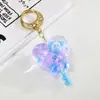 Llavero de acrílico con botella de arena movediza de aceite de dibujos animados, llavero para coche, colgante de botella de amor creativa, colgante pequeño para bolsa