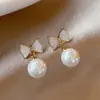 Brincos de Pérola Barroca de Imitação de Alta Qualidade Nicho Acessível de Luxo Laço Brincos de Diamante Flash 2025 Novo Estilo Quente Brincos