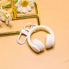 Nuevo llavero creativo de auriculares 3D, un accesorio moderno y genial para bolsos, joyería hecha a mano para manualidades y materiales para accesorios, al por mayor