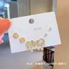 Pendientes pequeños de una semana, populares pendientes pequeños de aguja de plata S925, una tarjeta, tres pares de pendientes de combinación de traje, pendientes de circonita roja de red para mujer