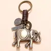 Colgante de elefante tejido a mano de aleación retro personalizado creativo llavero de piel de vaca joyería simple para comercio electrónico transfronterizo