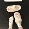 Zapatillas de felpa de algodón con rayas de conejito de dibujos animados lindas para otoño e invierno 2026 para mujer, cálidas y antideslizantes, adecuadas para usar en casa y al aire libre