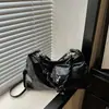 Bolsa de Ombro/Transversal Feminina Cor Sólida Outono Nicho Moda Nova Popular Bolsa Tote para o Dia a Dia 2026