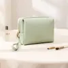 2025 nuevo ins de alta gama impermeable PU bolsa de maquillaje para mujer bolsa de almacenamiento de cosméticos bolsa de lavado de alto valor anís