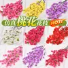 Ramas de flor de durazno artificial al por mayor para decoración de bodas, accesorios de fotografía, arreglos florales, flores artificiales de seda de plástico, ramas de flor de durazno artificiales