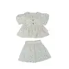 Conjunto de Ropa para Niñas Estilo Francés Primavera/Verano 2026 Otoño Nuevo Camisa de Manga Corta con Cuello Peter Pan + Falda Ropa Infantil