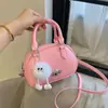 Bolsa de mão nicho estilo bowling estrangeiro de alta qualidade nova bolsa pequena transversal feminina bolsa de ombro de alta qualidade dopamina atacado