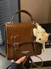 Mochila casual trendy estilo universitario 2026 versión coreana para mujer, moderna y elegante para ir al trabajo y viajar, mochila pequeña y bolso de mano para mujer
