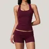 Conjunto de fitness europeo y americano transfronterizo, conjunto de dos piezas de top sin mangas de cuello halter de color liso y shorts ajustados, atuendo deportivo de running y yoga para mujer